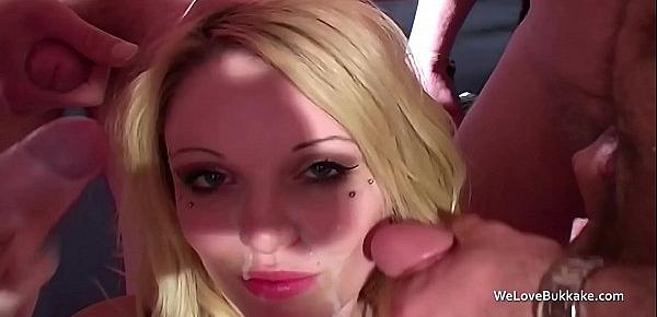  Wanking guys off until they cum on her face